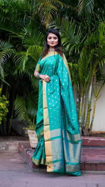 Look Attractive Wearing This Fine Colored Saree Paired With Maching Colored Blouse.  This Heavy Designer Saree Is Cotton Silk Based Weving Jacquard Butti Design Which Gives A Rich Look To Your Personality. Buy This Pretty Saree Now.