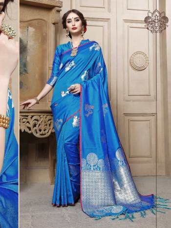 Adorn The Pretty Angelic Look Wearing This Heavy Designer Saree In Rich Color Paired With Contrasting Colored Blouse. This Saree Is Fabricated On Cotton Silk Paired With Cotton Silk Fabricated Blouse With Jacquard Weaving Silver Jari Design. Its Pretty Color Pallete Will Give An Attractive Look To Your Personality. 