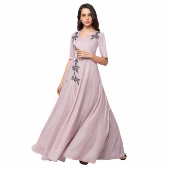 This Floor Length Pink Gown  is crafted in SIMMER, features a  Short Sleeves and  round_neck ,embellishments all over, a zip closure on the side and a regular fit. Style this gown with matching jewellery and pair it with heels to make a statement look.