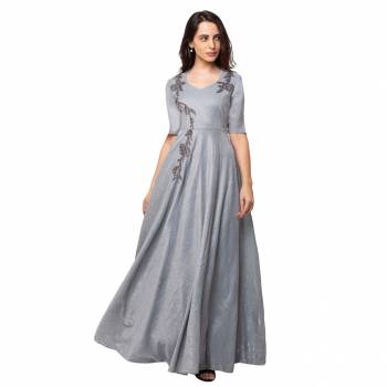 This Floor Length Grey Gown is crafted in SIMMER, features a  Short Sleeves and  round_neck ,embellishments all over, a zip closure on the side and a regular fit. Style this gown with matching jewellery and pair it with heels to make a statement look.