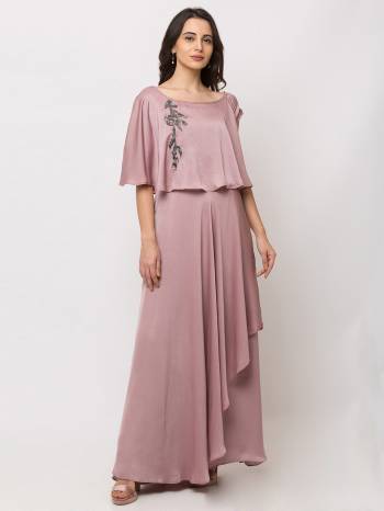 This Floor Length Pink Gown  is crafted in Cotton , features a  Short Sleeves and  round_neck ,embellishments all over, a zip closure on the side and a regular fit. Style this gown with matching jewellery and pair it with heels to make a statement look.