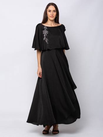 This Floor Length Black Gown   is crafted in Cotton , features a  Short Sleeves and  round_neck ,embellishments all over, a zip closure on the side and a regular fit. Style this gown with matching jewellery and pair it with heels to make a statement look.