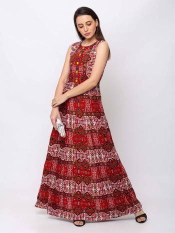 This Red maxi is crafted in Cotton features a Sleeveless and round ,embellishments all over, a zip closure on the side and a regular fit. Style This gown with matching jewellery and pair it with heels to make a statement look.