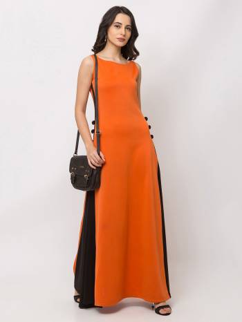 This Orange maxi is crafted in spandex lycra features a Sleeveless and boat neck ,embellishments all over, a zip closure on the side and a regular fit. Style This gown with matching jewellery and pair it with heels to make a statement look.