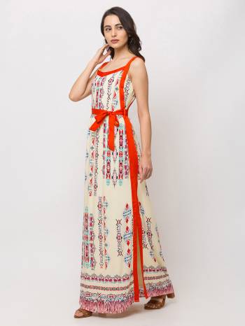 This Off white maxi  is crafted in Crepe features a Sleeveless and scoop ,embellishments all over, a zip closure on the side and a regular fit. Style This gown with matching jewellery and pair it with heels to make a statement look.