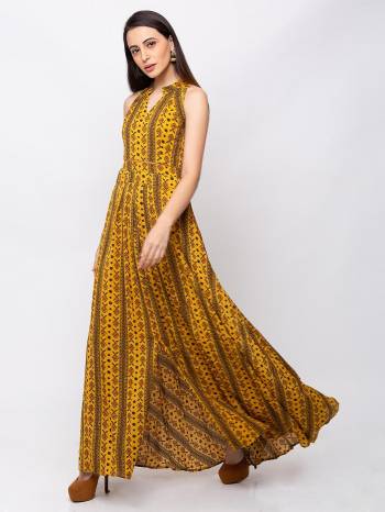 This Mustard maxi is crafted in Crepe features a Sleeveless and mandarin ,embellishments all over, a zip closure on the side and a regular fit. Style This gown with matching jewellery and pair it with heels to make a statement look.