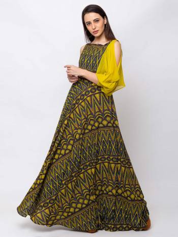 This Green maxi is crafted in Crepe features a one side sleeve and boat neck ,embellishments all over, a zip closure on the side and a regular fit. Style This gown with matching jewellery and pair it with heels to make a statement look.