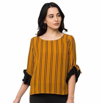 This Mustard Top Is Crafted In Polyster With NA Pattern.Featuring A round stripes Top.This Top offers a comfortable fit. Style this Top with a matching Jeans and a pair your regular sneakers to attain a casual look.