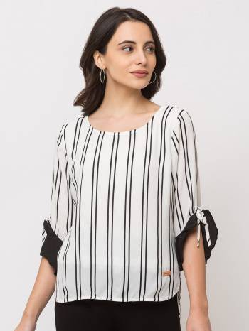 This White Top Is Crafted In Polyster With NA Pattern.Featuring A round stripes Top.This Top offers a comfortable fit. Style this Top with a matching Jeans and a pair your regular sneakers to attain a casual look.