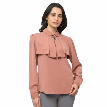 This Coral Top Is Crafted In Crepe With Solid Pattern.Featuring A peter pan Solids Top.This Top offers a comfortable fit. Style this Top with a matching Jeans and a pair your regular sneakers to attain a casual look.