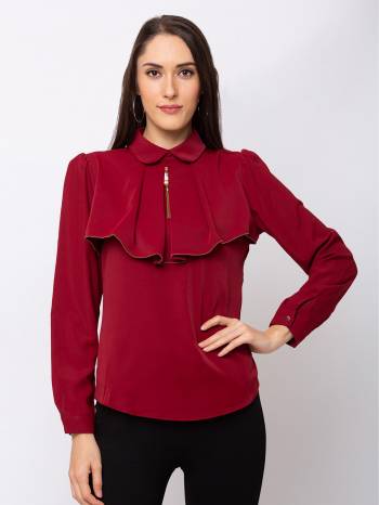 This Maroon Top  Is Crafted In Crepe With Solid Pattern.Featuring A peter pan Solids Top.This Top offers a comfortable fit. Style this Top with a matching Jeans and a pair your regular sneakers to attain a casual look.