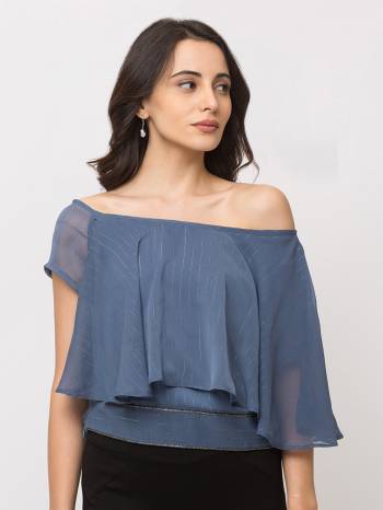 This Blue Top Is Crafted In Chiffon With Solid Pattern.Featuring A -shoulder Solids Top.This Top offers a comfortable fit. Style this Top with a matching Jeans and a pair your regular sneakers to attain a casual look.