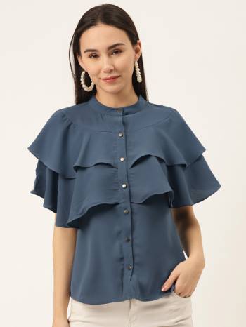 This Ocean Blue Top Is Crafted In Georgette With Solid Pattern Featuring A mandrain neck,half sleeves And Double layered cowl.This Top offers a comfortable fit. Style this Top with a matching  Jeans  and a pair your regular sneakers to attain a casual look.