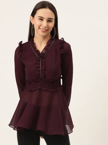 Wine color semi-sheer solid woven empire top with ruffled and smocked detail, has a V-neck, and long sleeves.This flattering top  will keep you comfortable in chilly weather. This maroon piece will have you date-ready when you put it with your favourite ankle boot and matching chunky necklace.