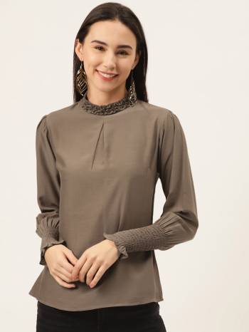 Olive brown solid woven regular top with pleated detail, has a ruffled high neck, long sleeves, and button closure.Boost your personal style with this in-season long-sleeve top. A fabulous girls night out starts with the right outfit. Achieve one achieve when you pair this olive piece with a flowing cardigan and tonal shorts.