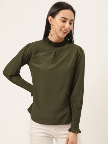 Olive Green solid woven regular top with pleated detail, has a ruffled high neck, long sleeves, and button closure.This beautiful long-sleeve top will take your style to new heights. This olive piece is perfect for hanging out with friends when you put it with a fabulous dark denim jean and your favourite pair of shoes.