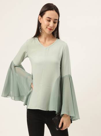 Sea Green solid woven A-line top, has a V-neck, and long bell sleeves.This in-style long-sleeve top  will keep you toasty any time of the year. This sea green piece is perfect for dates when you style it with a Chelsea boot and matching bag.