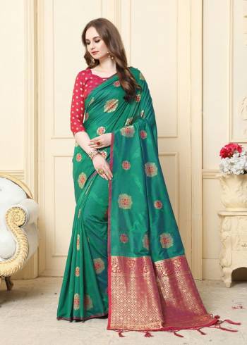 Look Attractive Wearing This Dark Colored Saree Paired With Maching Colored Blouse.  This Heavy Designer Saree Is Cotton Silk Based Weaving Jacquard Rich Pallu Which Gives A Rich Look To Your Personality. Buy This Pretty Saree Now.