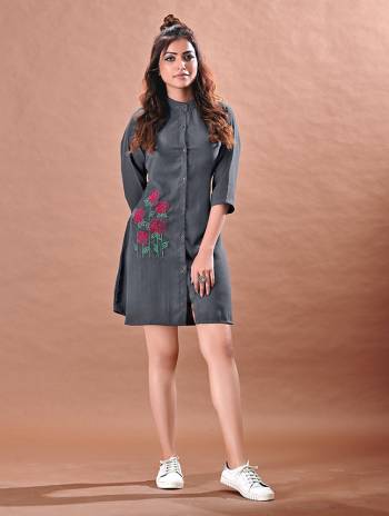 Grab This Readymade Long Kurti In Fine Color Fabricated On Rayon Beautified With Hand Embroidery. It Is Light In Weight And Easy To Carry All Day Long. 