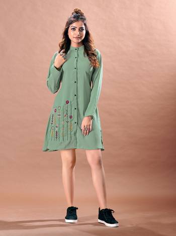 Grab This Readymade Long Kurti In Fine Color Fabricated On Rayon Beautified With Hand Embroidery. It Is Light In Weight And Easy To Carry All Day Long. 