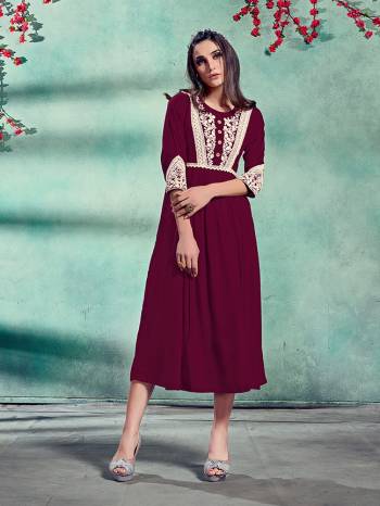 Grab This Readymade Long Kurti In Fine Color Fabricated On Rayon Beautified With Embroidery. It Is Light In Weight And Easy To Carry All Day Long. 