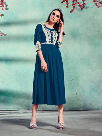 Grab This Readymade Long Kurti In Fine Color Fabricated On Rayon Beautified With Embroidery. It Is Light In Weight And Easy To Carry All Day Long. 