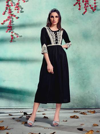 Grab This Readymade Long Kurti In Fine Color Fabricated On Rayon Beautified With Embroidery. It Is Light In Weight And Easy To Carry All Day Long. 