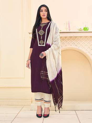 Here Is A Pretty Dress Material In Dark Color With Attractive Hand Embroidery Work, Get This Stitched As Per Your Desired Fit And Comfort. Its Top Is Fabricated On Rayon Paired With Cotton Khadi Pant With Lace Work And Chanderi Wevon Jari Dupatta. 

