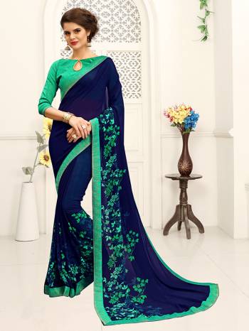 Look Attractive Wearing This Coloithred Saree Printed Paired With Blouse.  This Heavy Designer Saree Is Georgette Based & Benglori Silk Based Blouse With Lace Border Which Gives A Rich Look To Your Personality. Buy This Pretty Saree Now.