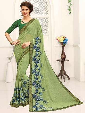 Look Attractive Wearing This Coloithred Saree Printed Paired With Blouse.  This Heavy Designer Saree Is Georgette Based & Benglori Silk Based Blouse With Lace Border Which Gives A Rich Look To Your Personality. Buy This Pretty Saree Now.