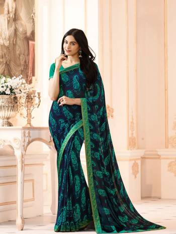 Adorn The Pretty Angelic Look Wearing This Heavy Designer Saree In Paired With Contrasting Blouse. This Saree Is Fabricated On Georgette Paired With Banglori Silk Fabricated Blouse. Its Pretty Color Pallete Will Give An Attractive Look To Your Personality. 