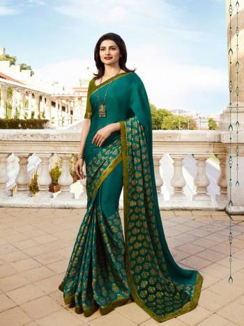 Adorn The Pretty Angelic Look Wearing This Heavy Designer Saree In Paired With Contrasting Colored Blouse. This Saree Is Fabricated On Georgette Paired With Banglori Silk Fabricated Blouse. Its Pretty Color Pallete Will Give An Attractive Look To Your Personality. 