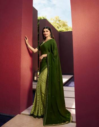 Celebrate This Festive Season In This Very Pretty Colored Designer Saree Paired With Contrasting Colored Blouse. This Saree Is Georgette Base and Blouse Are Banglori Silk Based Beautified With Printed. 