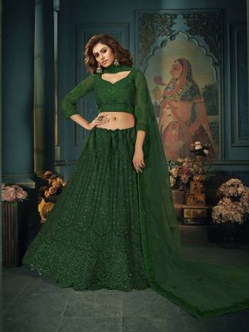 Heavy Designer Lehenga Choli & dupatta In Dark Fine Color Fabricated On Net Beautified With Heavy Attractive Embroidery. Wedding Special.