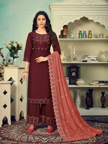 Here Is A Beautiful Heavy Designer Suit In All Over Color. Its Heavy Embroidered Top And Bottom Are Chinon Based Paired With Stiched And Gadwal Cotton Dupatta Are Embroidered. Its Fabrics Are Light Weight And Easy To Carry All Day Long. 