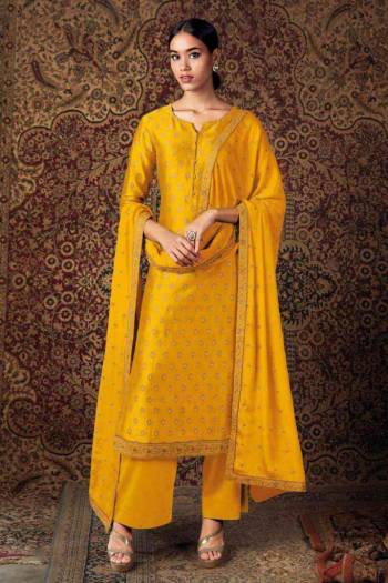 Yellow Jam Silk pakistani style straight salwar kameez. The floral Foil Print , lace multi embroidered work lace and resham work Comes with matching bottom and Nazneen embroidered lace and diamond work dupatta