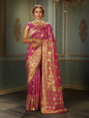 Look Attractive Wearing This Colored Saree Paired With Maching Colored Blouse.  This Heavy Designer Saree Is Banarasi Silk Based Which Gives A Rich Look To Your Personality. Buy This Pretty Saree Now.