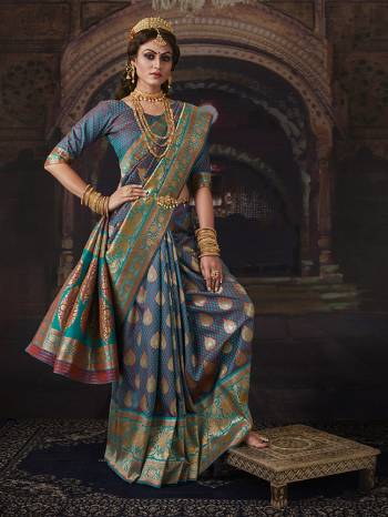 Look Attractive Wearing This Colored Saree Paired With Maching Colored Blouse.  This Heavy Designer Saree Is Banarasi Silk Based Which Gives A Rich Look To Your Personality. Buy This Pretty Saree Now.