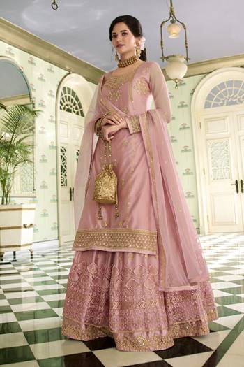 Beautiful looks in this Fine COLOR fabric On Art Silk with inner  and SHARARA semi stiched type and bottom chudidar style suit with embroidered floral patterns on the yoke and sleeves. Comes with matching dupatta.