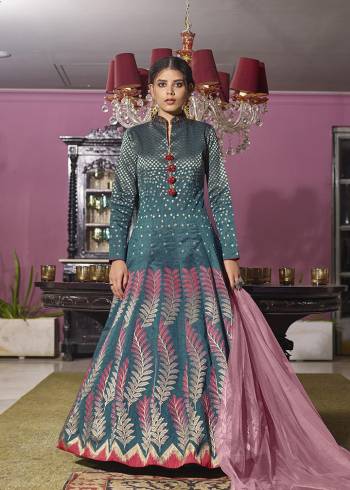 Flaunt Your Rich And Elegant Taste Wearing This Designer Readymade Long Gown In Fine Color. This  Pretty Gown Is Fabricated On Art Silk Beautified With Wevon Jacquard Design And Additional Hand Work And Net Dupatta. Its Fabric Is Soft Towards Skin And Easy To Carry All Day Long. 