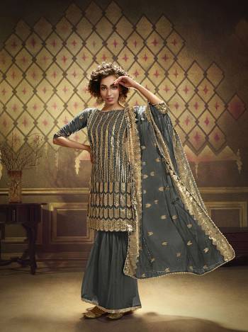 Celebrate This Festive Season With Beauty And Comfort Wearing This Heavy Designer Sharara Suit In Fentastic Color. Its Top Is Fabricated on Soft Net Paired With Soft Net Fabricated Bottom And Soft Net Dupatta With Exlent Sequance Embroidery.?