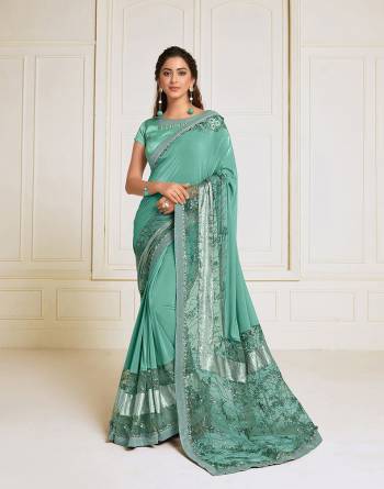 Celebrate This Festive Season In This Very Pretty Fancy Colored Designer Saree Paired With Maching Colored Blouse. This Saree Lycra and Blouse Raw Silk Based Beautified With Detailed Embroidery Cut Work Designer Saree. 