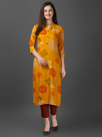 Grab This Readymade Long Kurti In Fine Color Fabricated On Rayon Beautified With Printed. It Is Light In Weight And Easy To Carry All Day Long. 