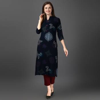 Grab This Readymade Long Kurti In Fine Color Fabricated On Rayon Beautified With Printed. It Is Light In Weight And Easy To Carry All Day Long. 