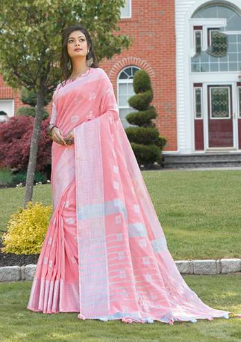 Look Attractive Wearing This Saree Paired With Blouse Are Wevon Work.  This Heavy Designer Saree Is Linen Based Which Gives A Rich Look To Your Personality. Buy This Pretty Saree Now.