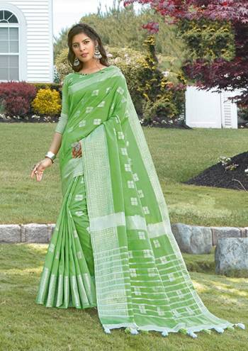 Look Attractive Wearing This Saree Paired With Blouse Are Wevon Work.  This Heavy Designer Saree Is Linen Based Which Gives A Rich Look To Your Personality. Buy This Pretty Saree Now.