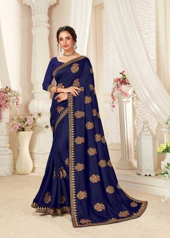 Grab This Pretty Elegant Looking Designer Saree In Paired With Blouse. This Saree And Blouse Are Vichitra Silk Based Beautified With Embroidery. Buy Now.