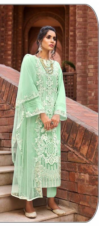 Grab This Attractive Looking Heavy Designer Straight Suit In Light Color. Its Embroidered Top And Dupatta Are Butterfly Net Based Paired With Santoon Bottom. Buy This Pretty Suit Now