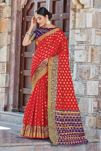 Grab This Pretty Elegant Looking Designer Saree In With Contrasting Colored Blouse. This Saree And Blouse Are Handloom Silk Based Beautified With Wevon Jari Jacquard And Stone Work. Buy Now.