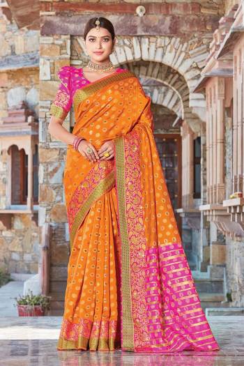 Grab This Pretty Elegant Looking Designer Saree In With Contrasting Colored Blouse. This Saree And Blouse Are Handloom Silk Based Beautified With Wevon Jari Jacquard And Stone Work. Buy Now.